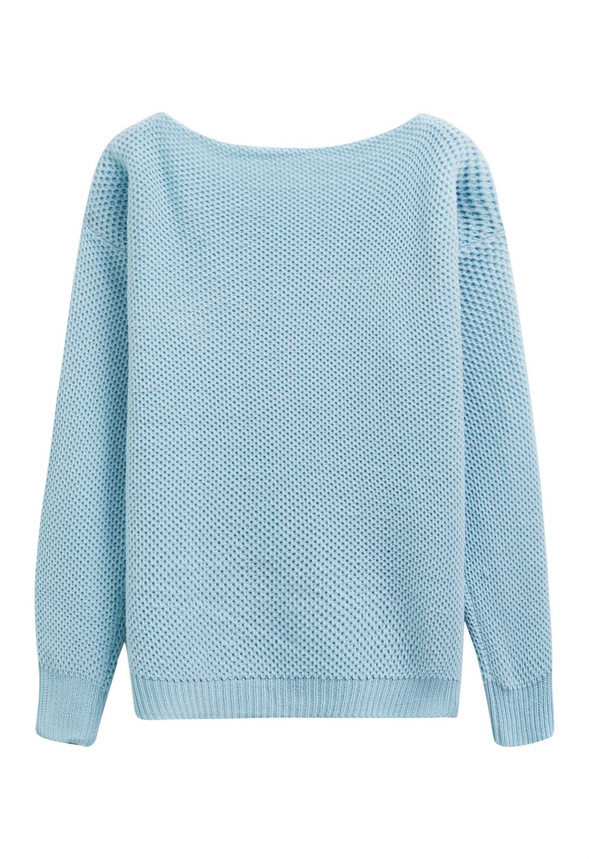 Pull en tricot gaufré boutonné avec poche plaquée en bleu bébé