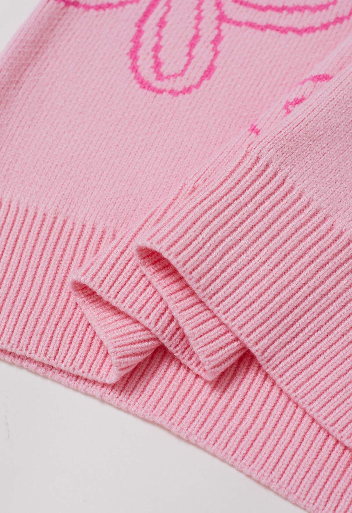 Pull en maille jacquard à motif floral en rose