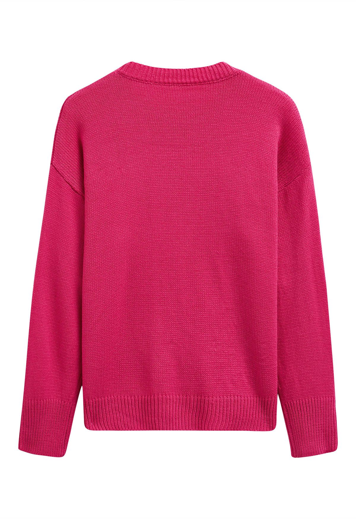 Pull coloré en tricot à fleurs en point 3D en rose vif