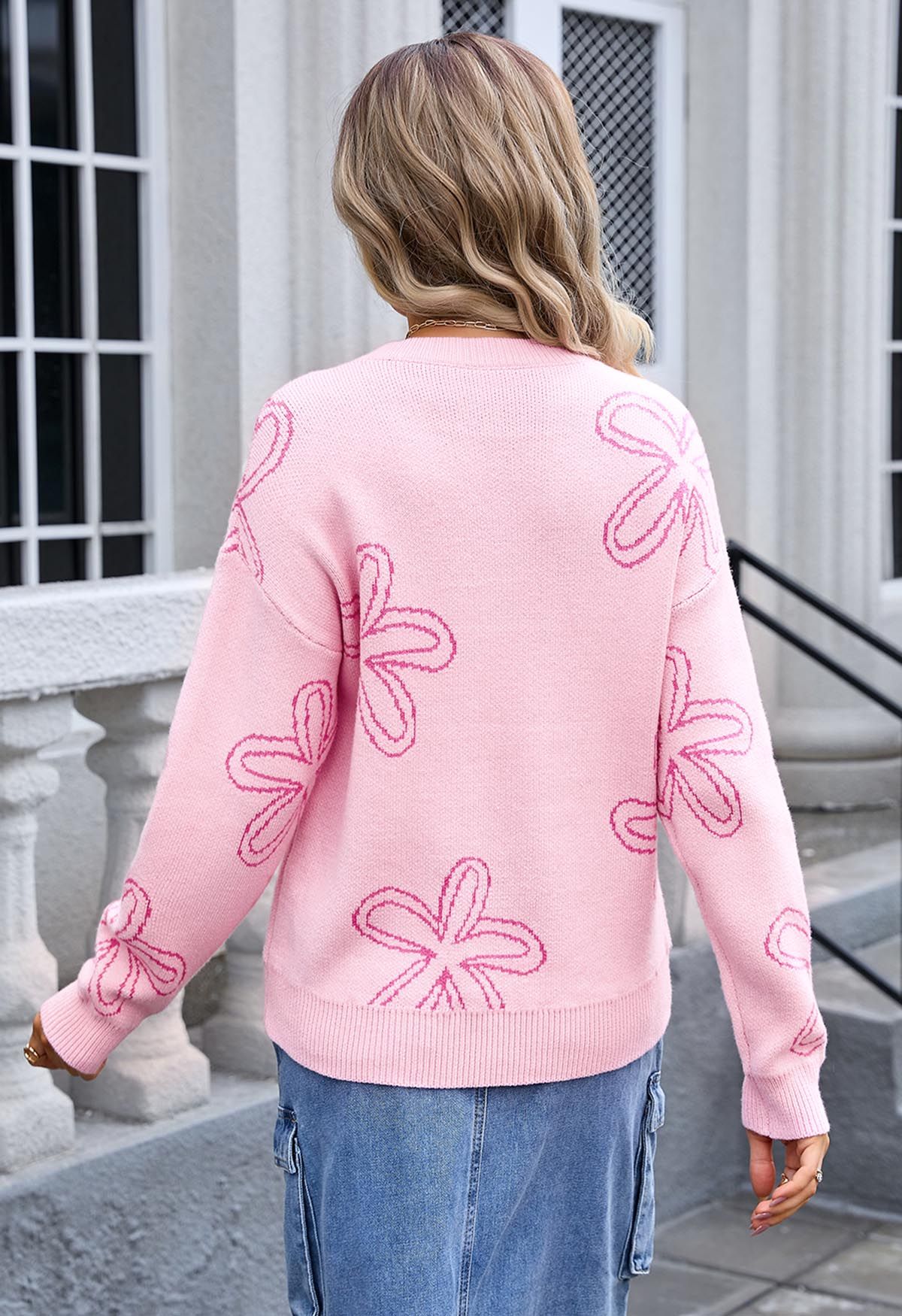 Pull en maille jacquard à motif floral en rose