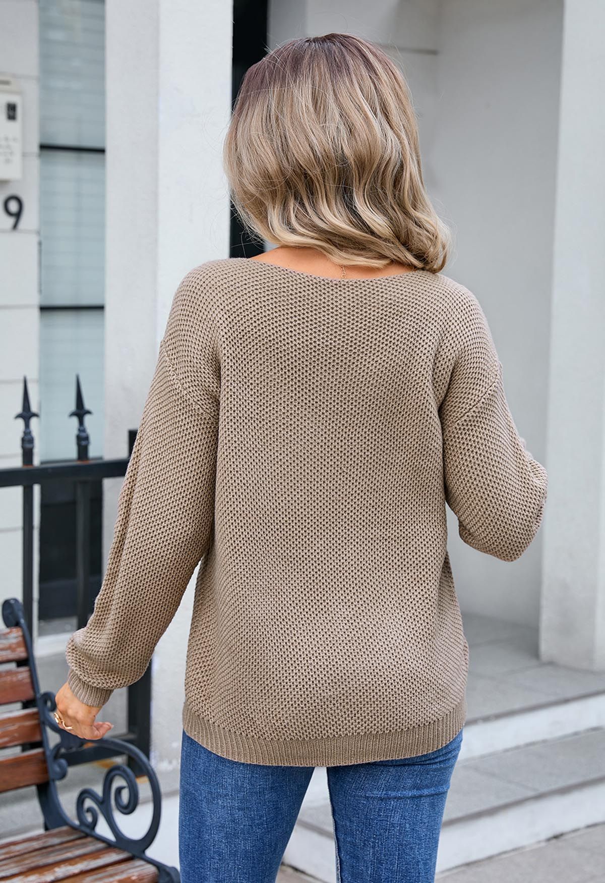 Pull en tricot gaufré boutonné avec poche plaquée en kaki