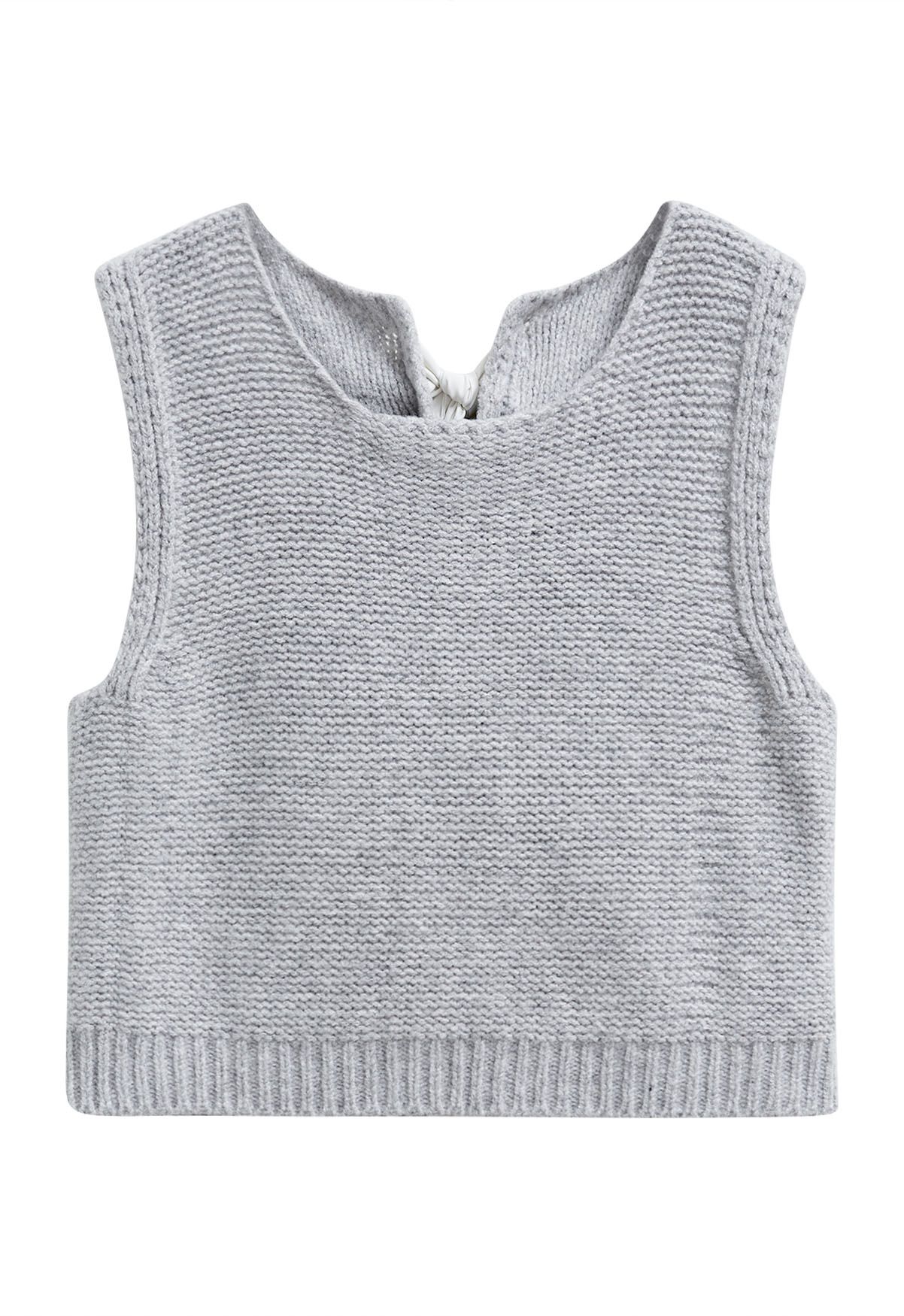 Gilet en tricot avec nœud papillon dans le dos en gris