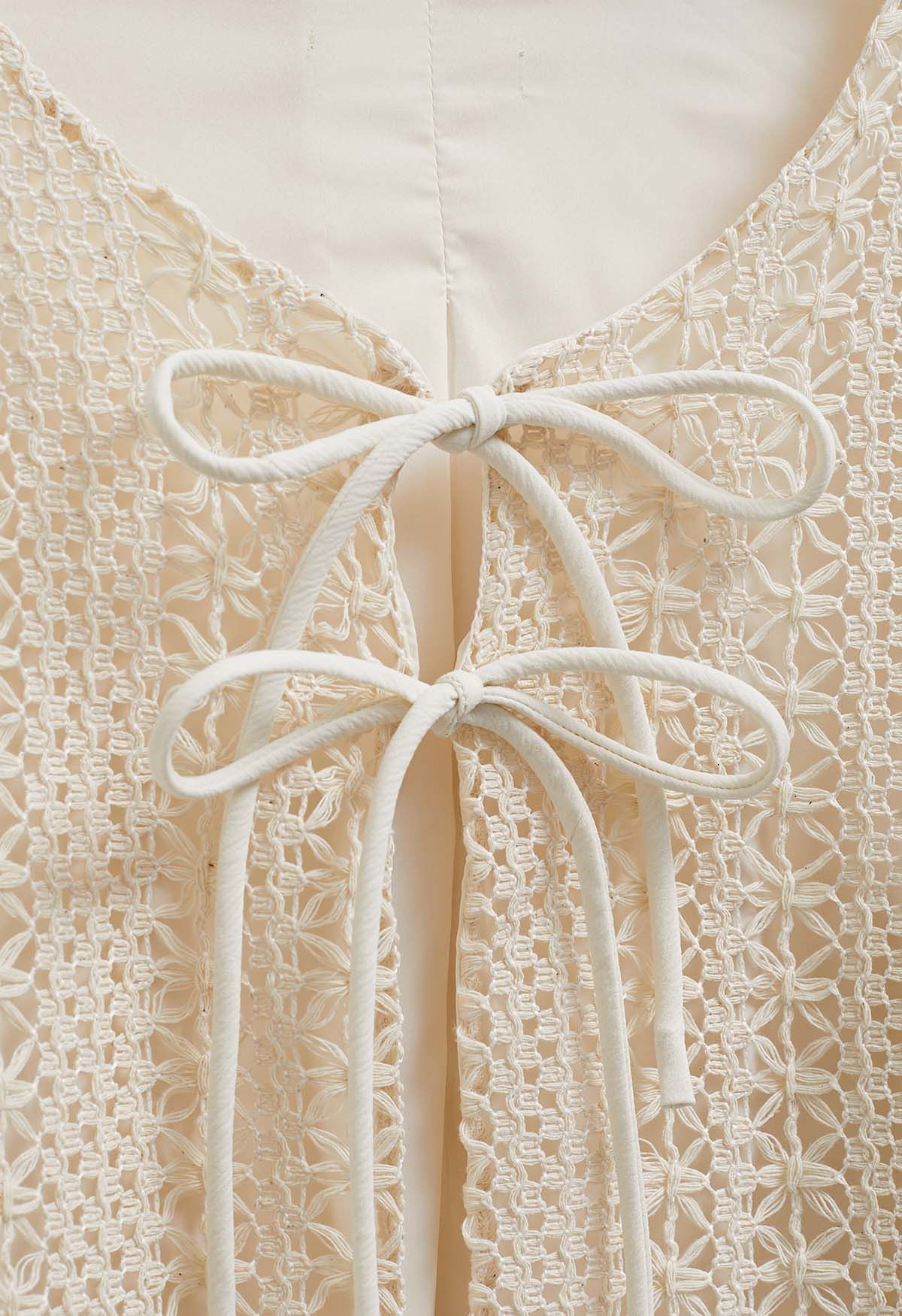 Veste à nœuds papillon au crochet complexe en crème