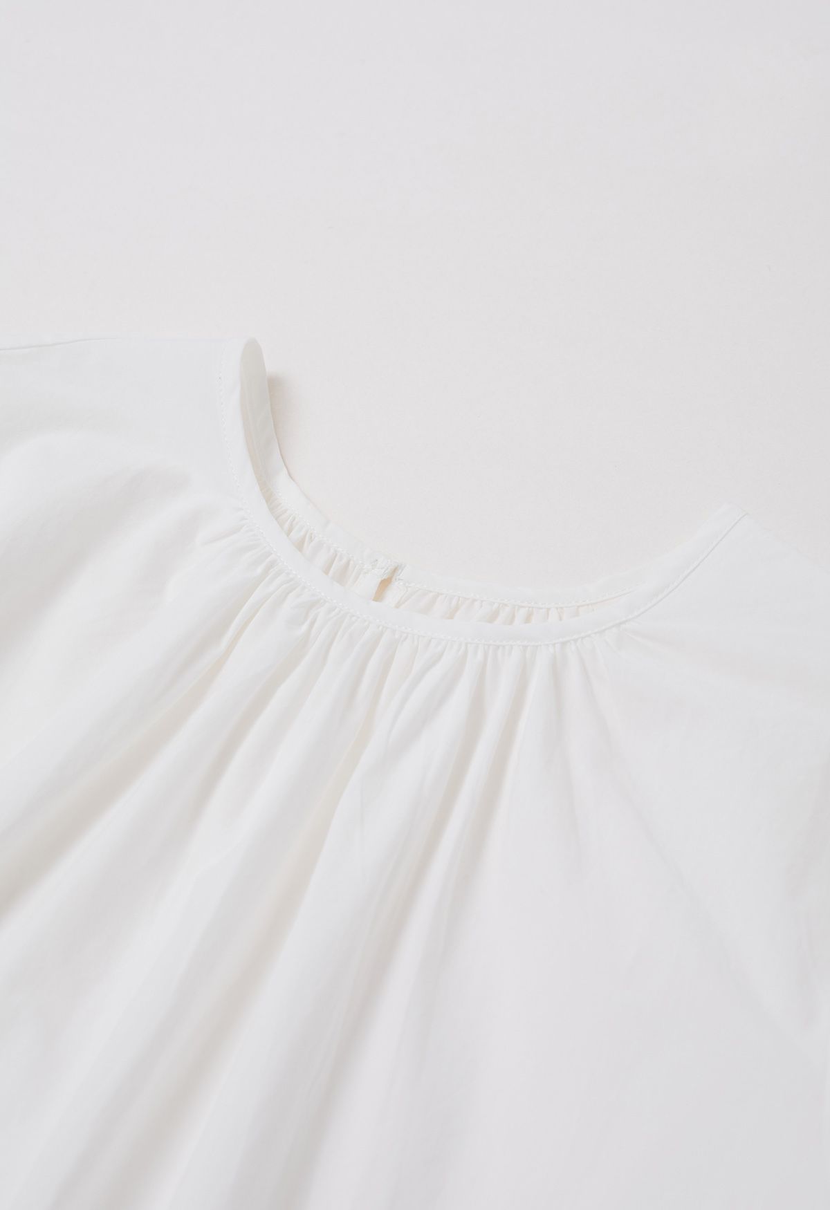 Chemise décontractée en coton à manches bouffantes en blanc