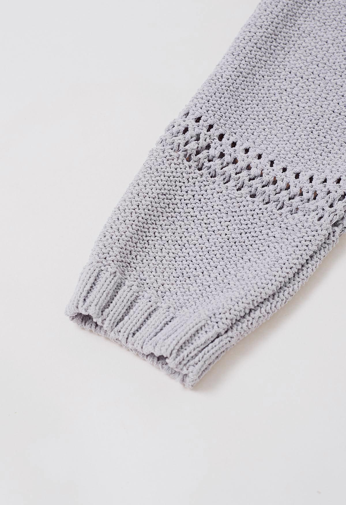 Haut en tricot à col noué et ajouré en gris