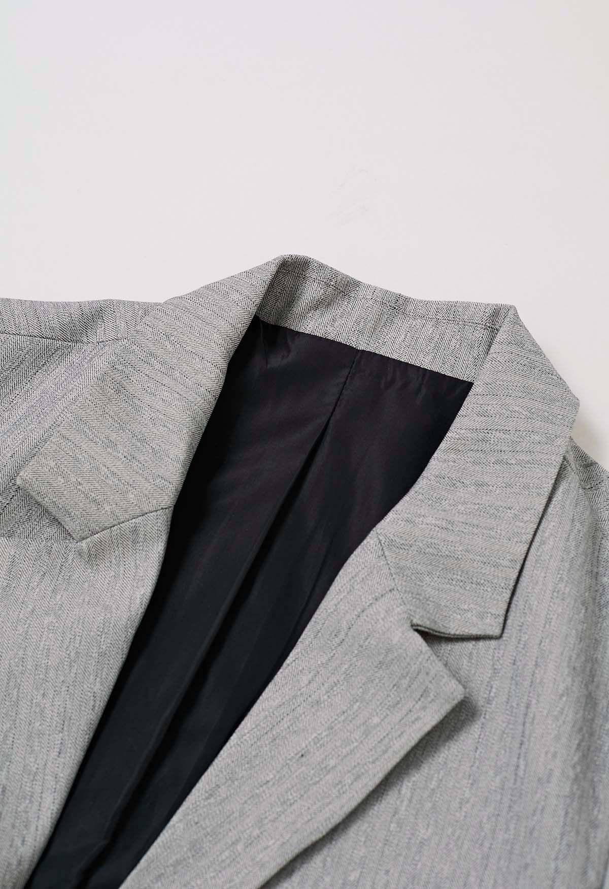 Faux blazer boutonné deux pièces en gris