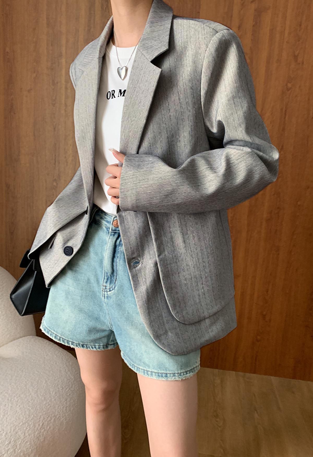 Faux blazer boutonné deux pièces en gris