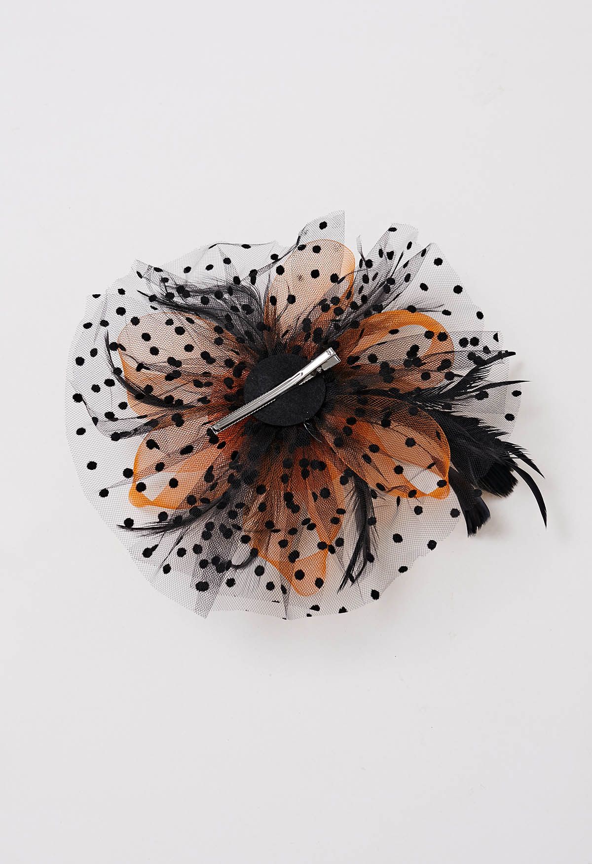 Bandeau en maille à pois avec pince à cheveux en orange