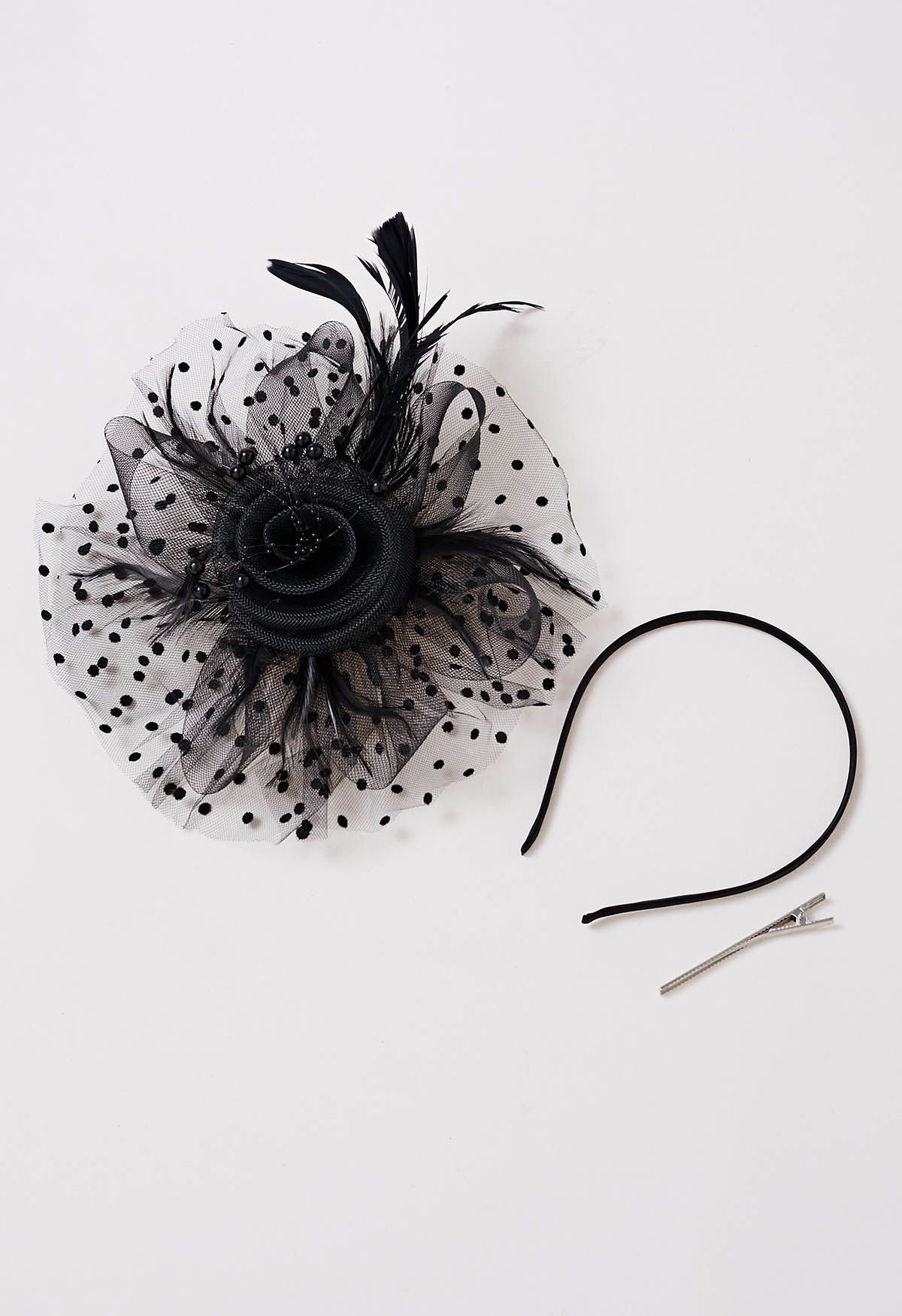 Bandeau en maille à pois avec pince à cheveux en noir