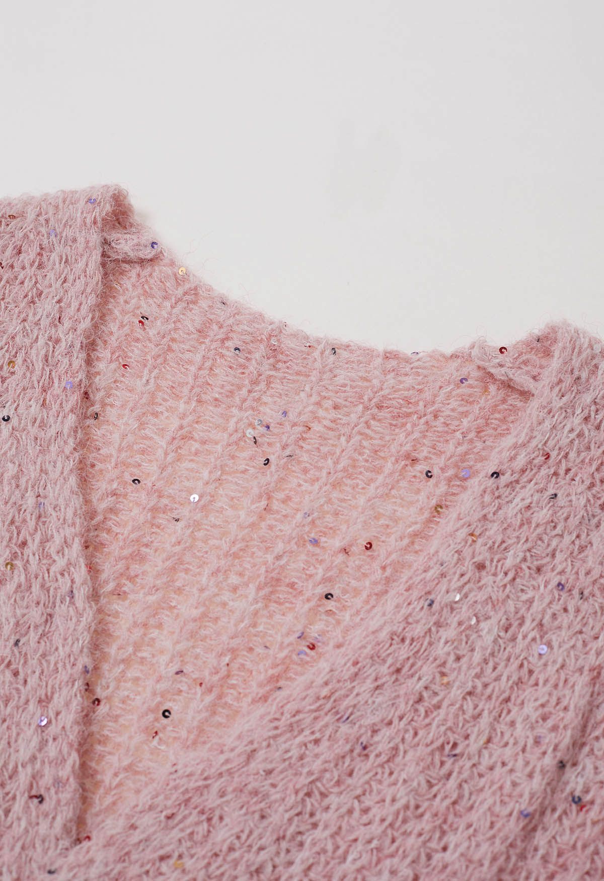 Cardigan en tricot confortable ouvert sur le devant à paillettes colorées en rose