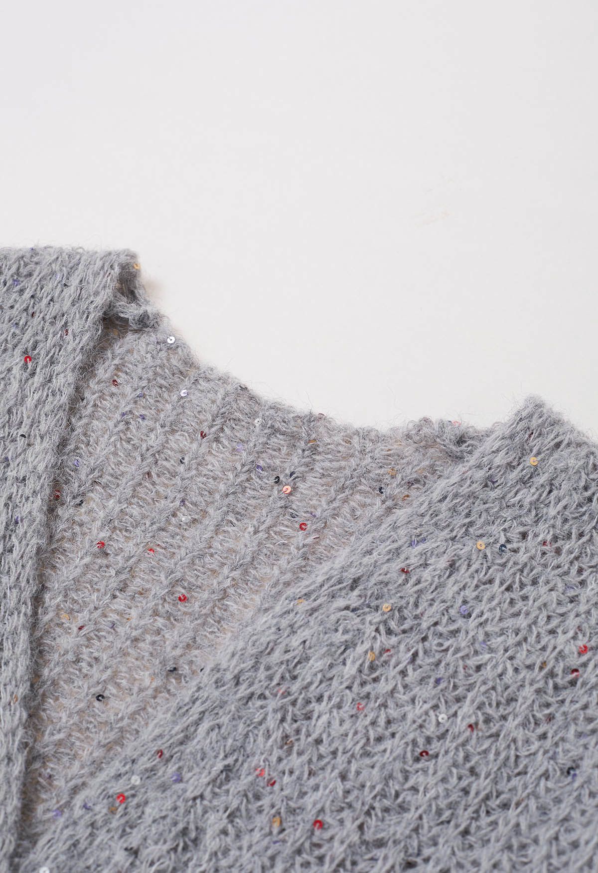 Cardigan en tricot confortable ouvert sur le devant à paillettes colorées en gris