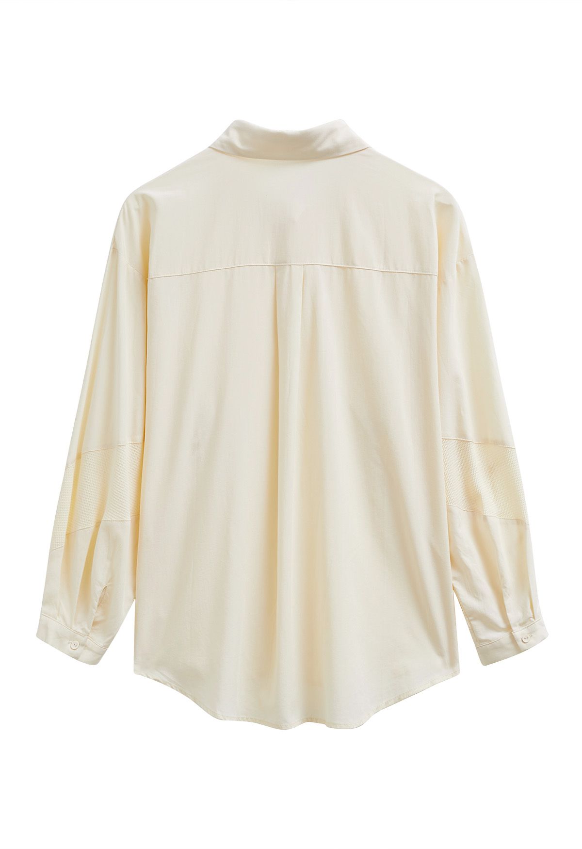 Chemise boutonnée en coton à empiècements géométriques couleur crème