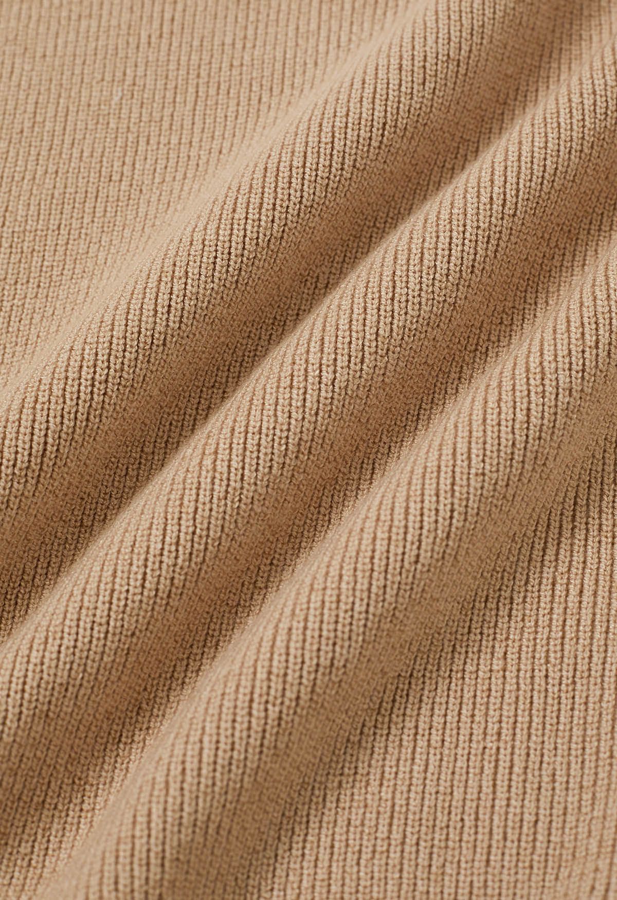 Haut en tricot cache-cœur à manches en maille fleurie duveteuse en beige clair