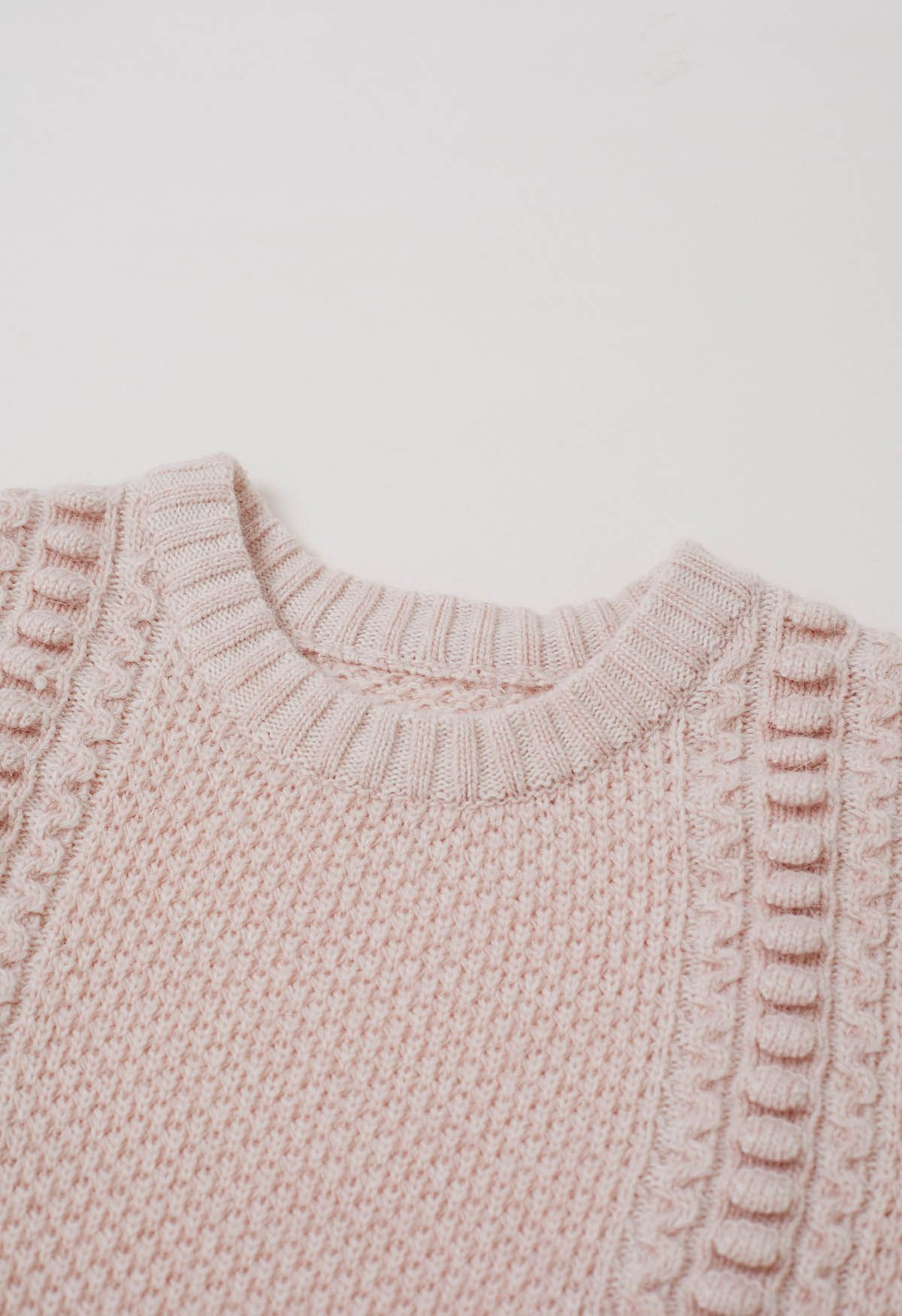 Pull en tricot à manches bouffantes et texture gaufrée en rose