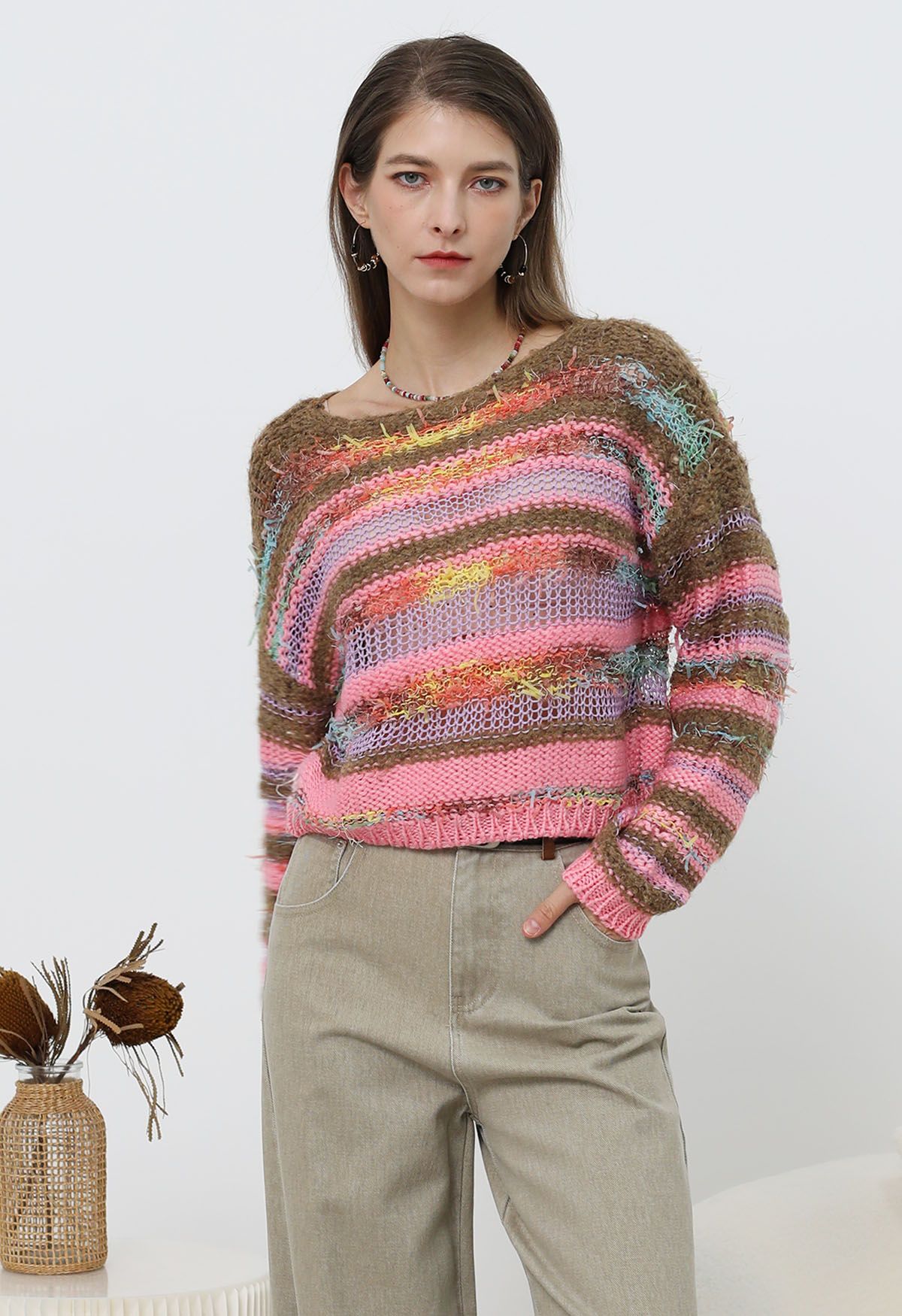 Pull en maille pointelle à rayures multicolores et franges en rose