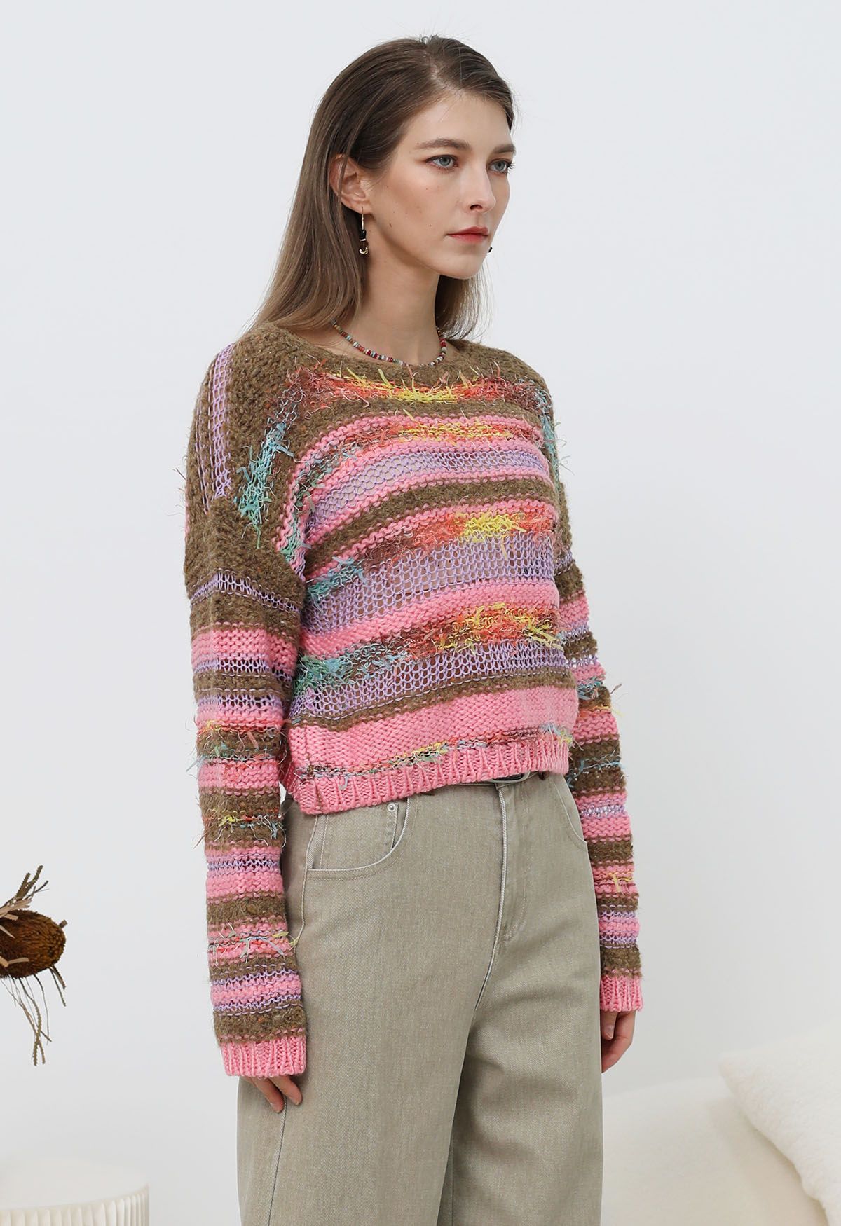 Pull en maille pointelle à rayures multicolores et franges en rose