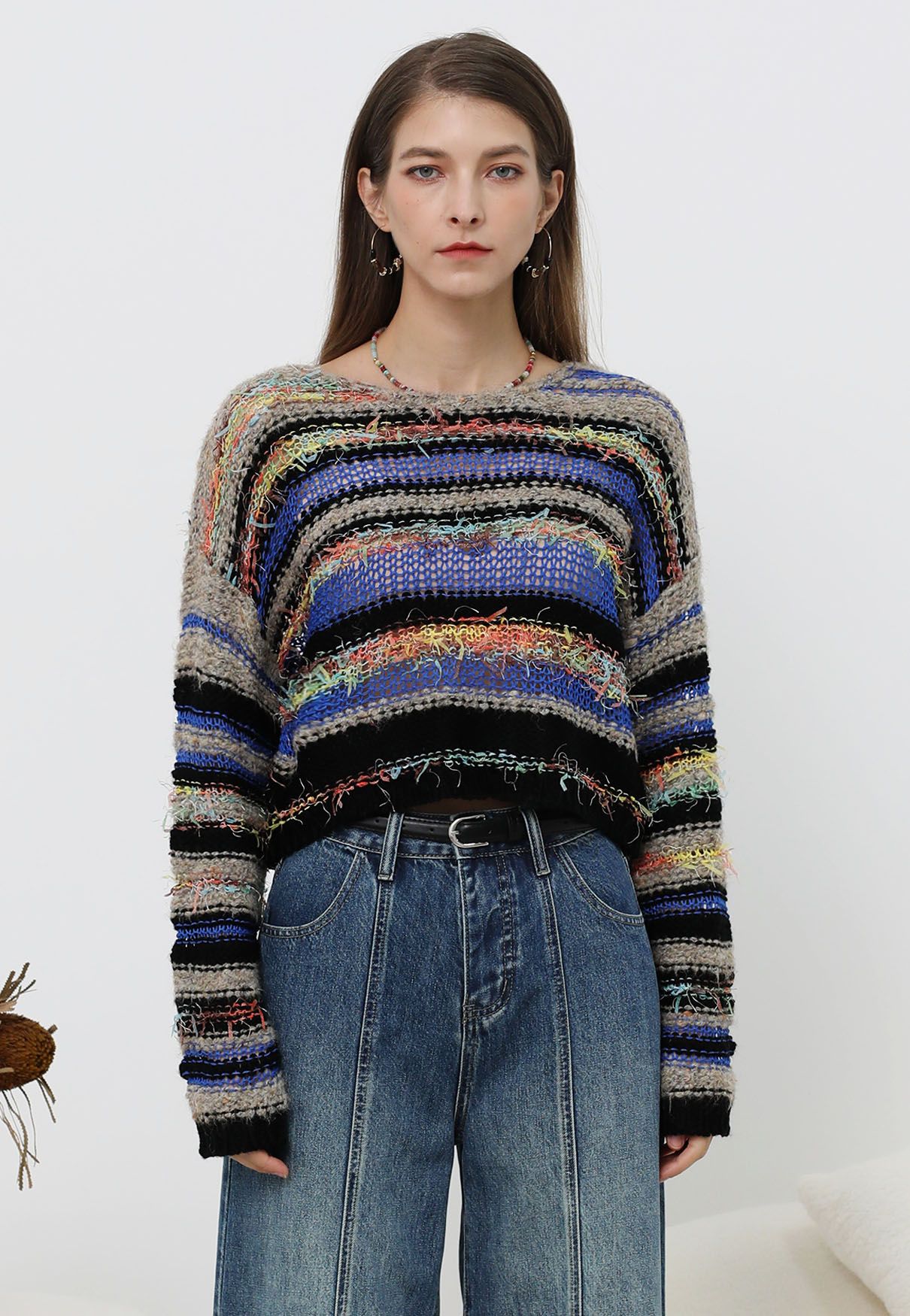 Pull en maille pointelle à rayures multicolores et franges en noir