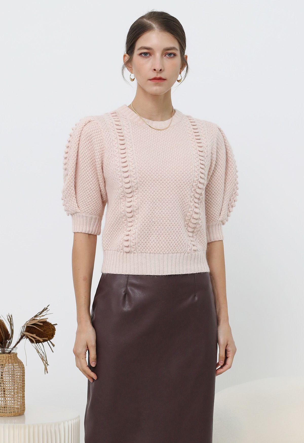 Pull en tricot à manches bouffantes et texture gaufrée en rose