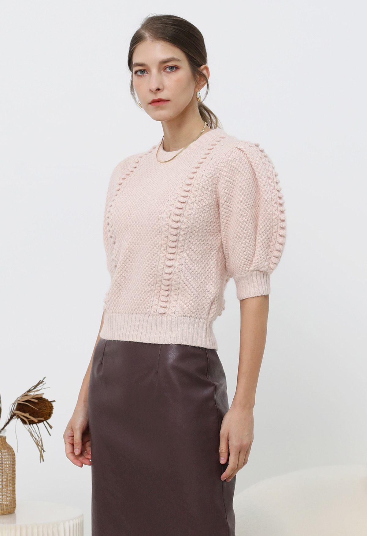 Pull en tricot à manches bouffantes et texture gaufrée en rose