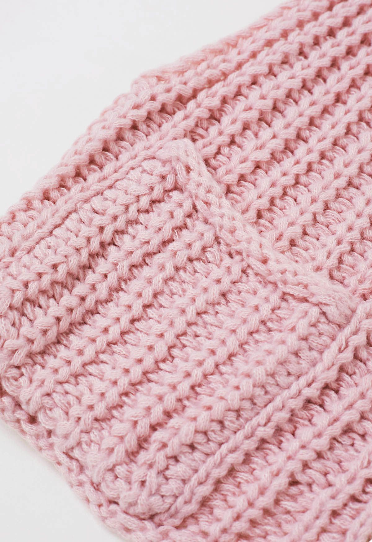 Gilet en tricot épais avec poches plaquées et boutons dorés audacieux en rose