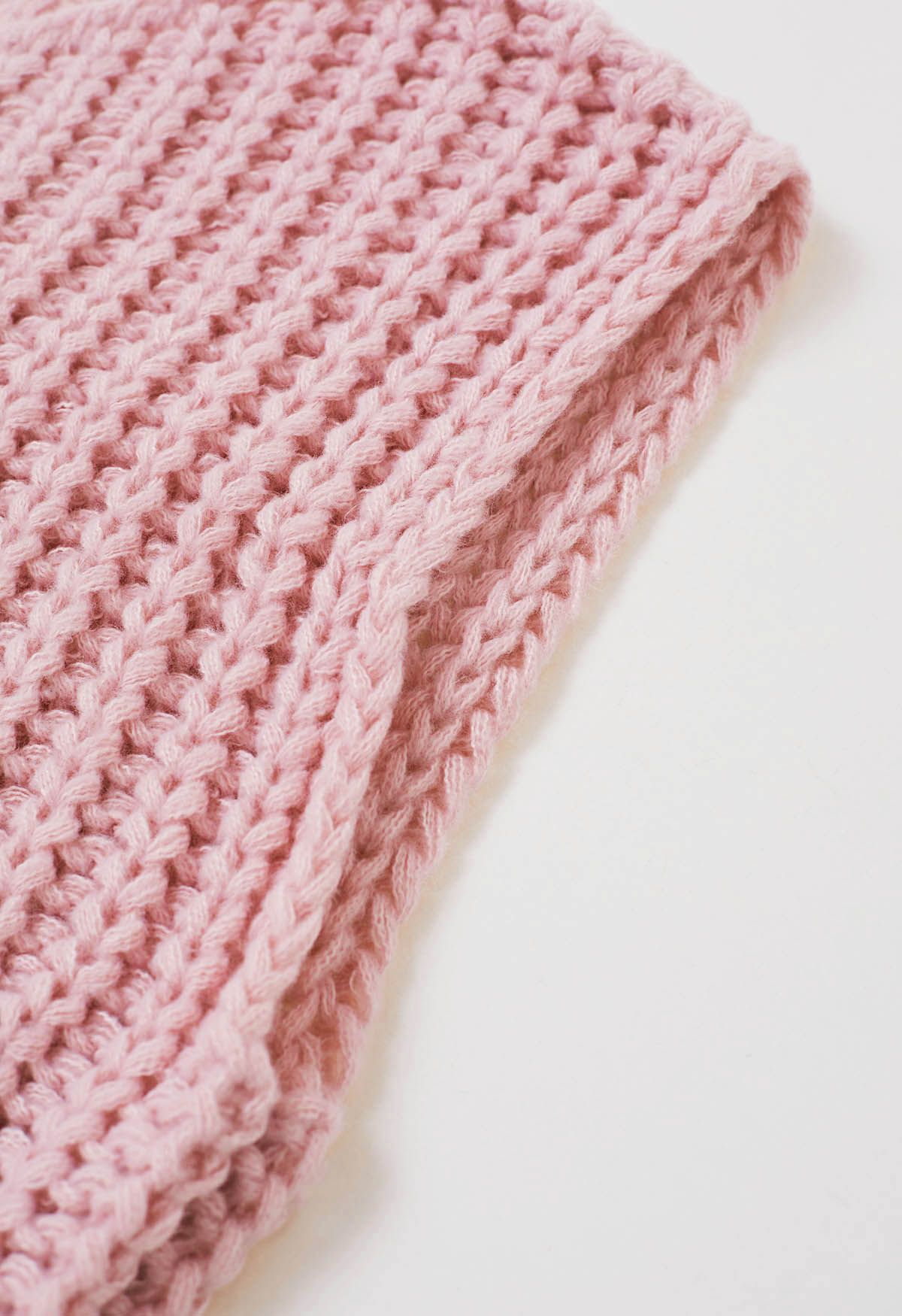 Gilet en tricot épais avec poches plaquées et boutons dorés audacieux en rose