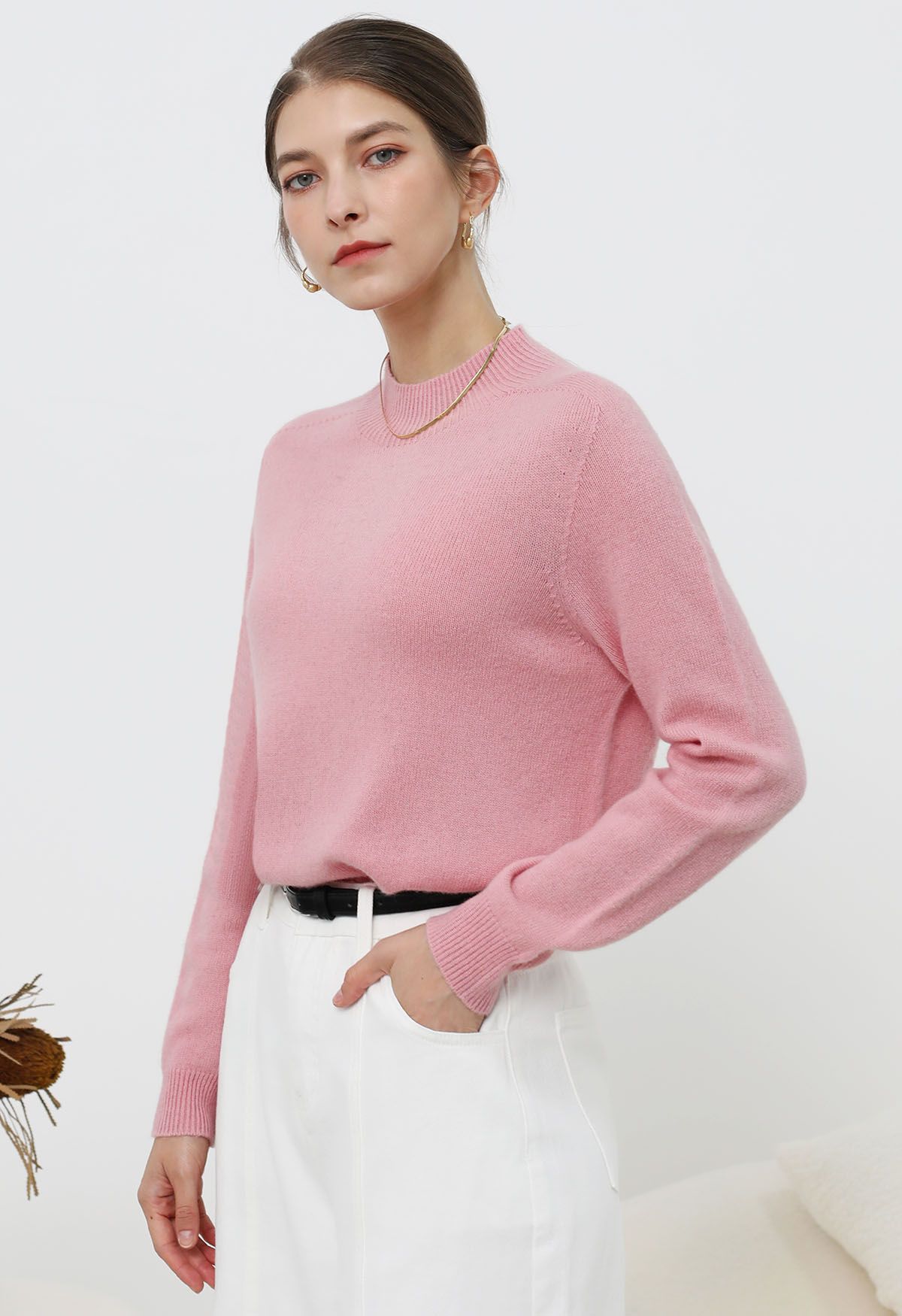 Pull en laine à manches longues et col montant réconfortant en rose