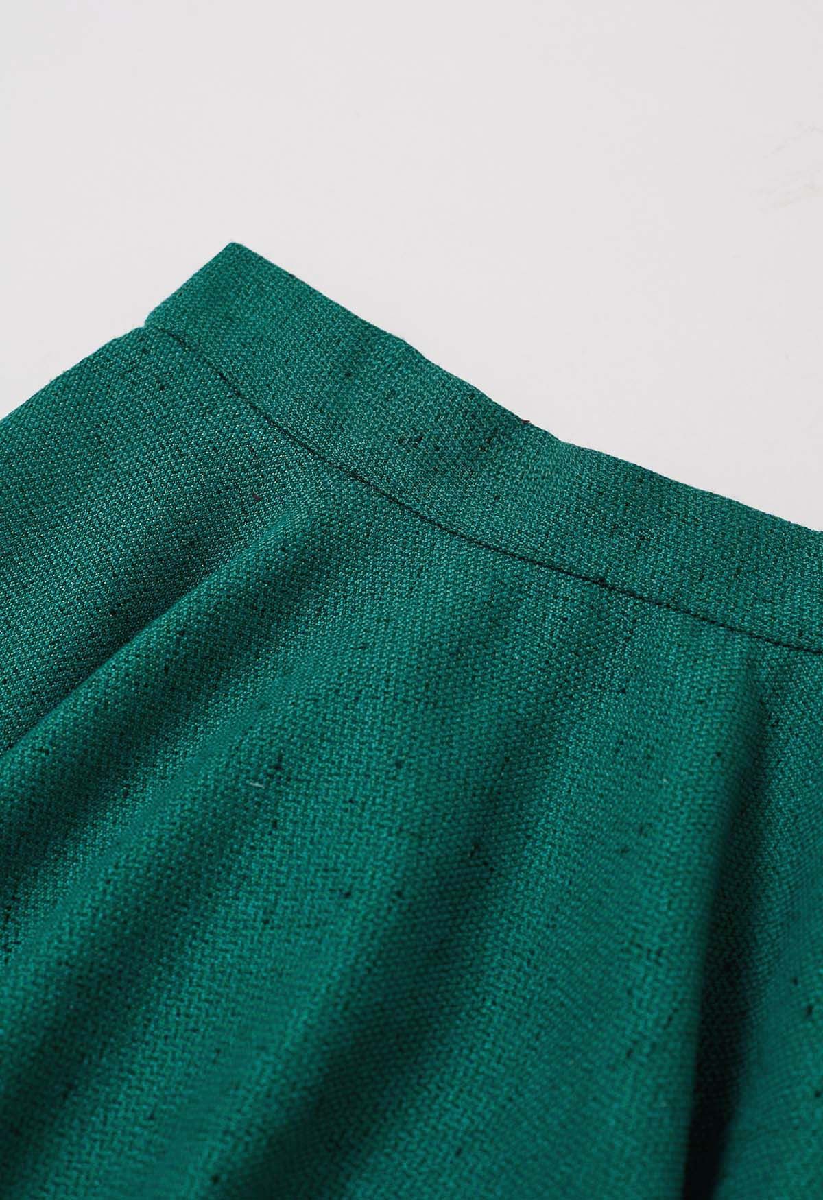 Jupe mi-longue évasée en tweed souple vert foncé, édition d'automne