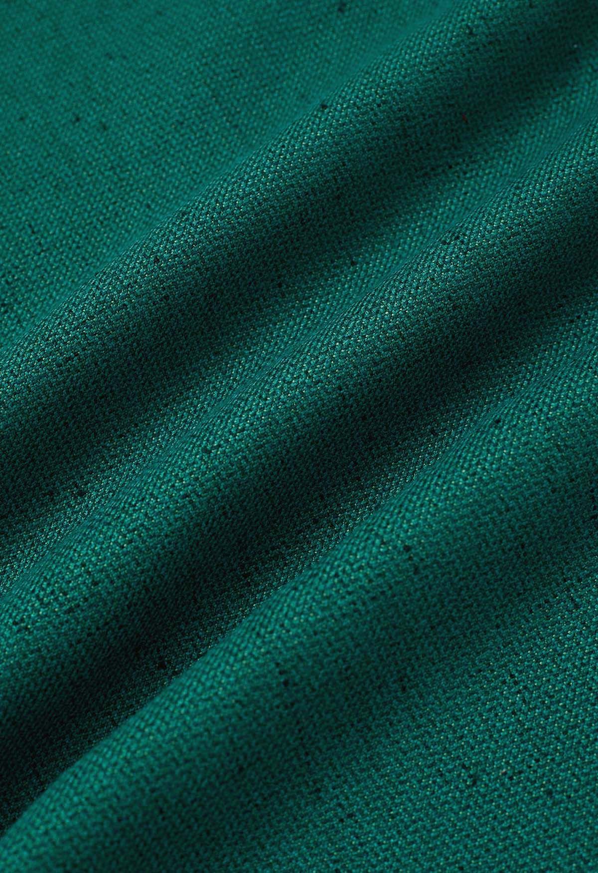 Jupe mi-longue évasée en tweed souple vert foncé, édition d'automne