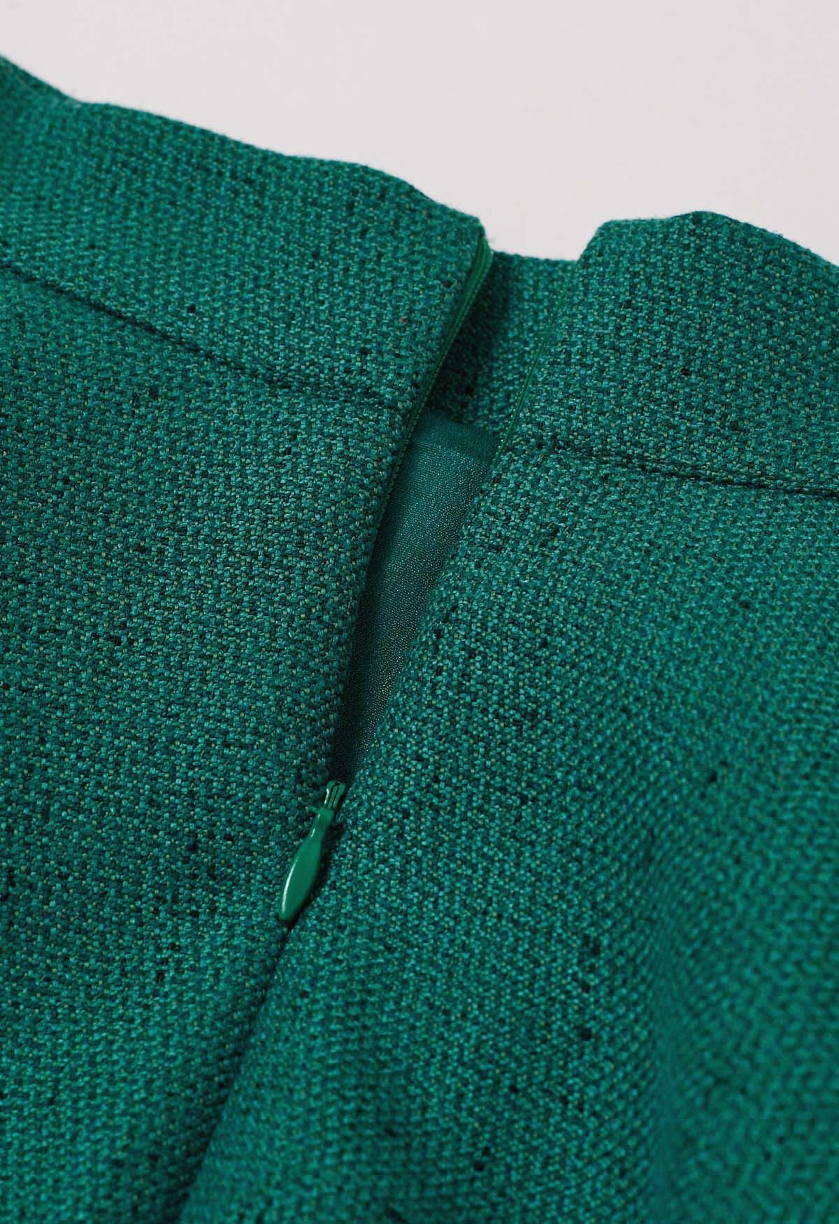 Jupe mi-longue évasée en tweed souple vert foncé, édition d'automne