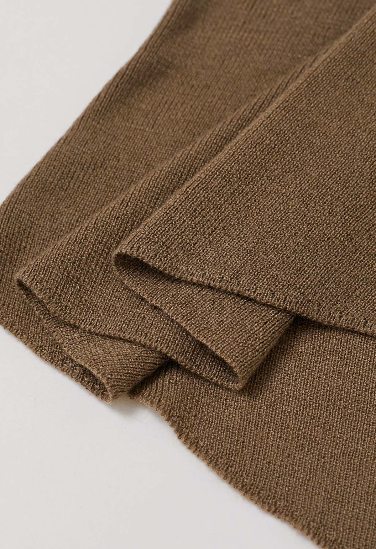 Haut en tricot à manches courtes et encolure nouée par un ruban en beige