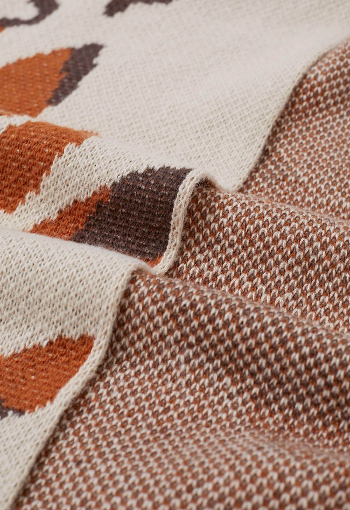 Poncho abstrait à franges aux teintes d'automne