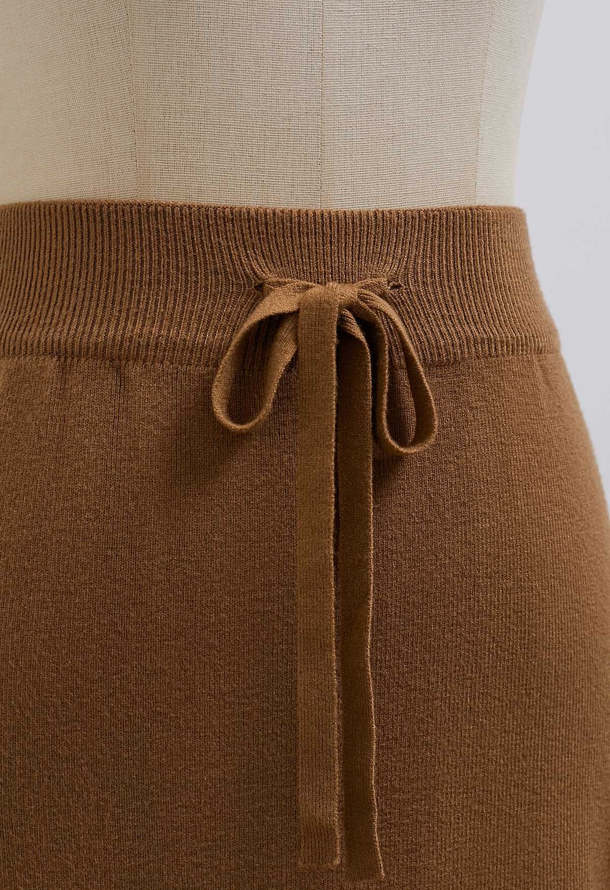 Jupe en tricot à fausses poches et taille nouée en caramel