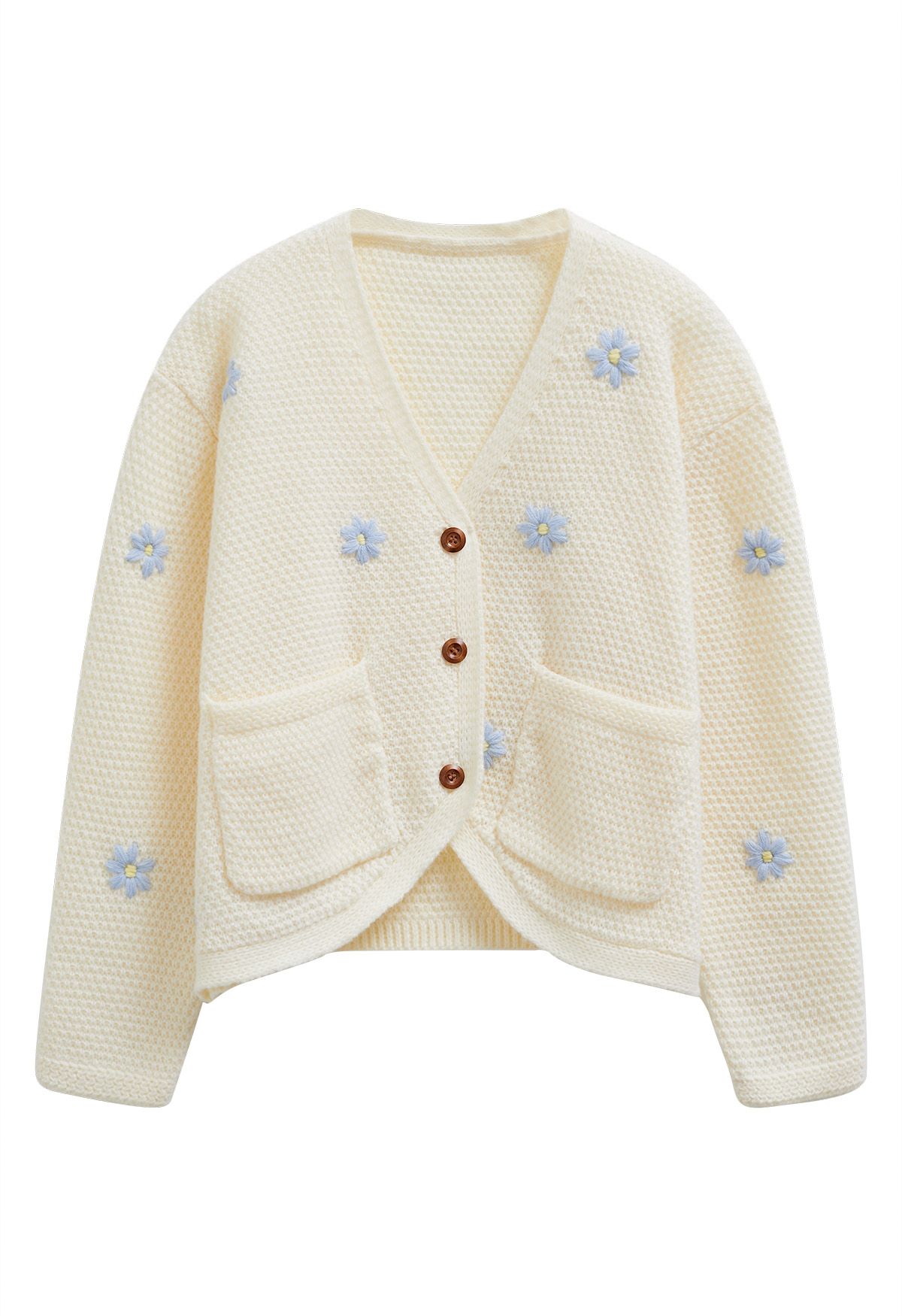 Cardigan en tricot gaufré à motif floral et point attachant en crème