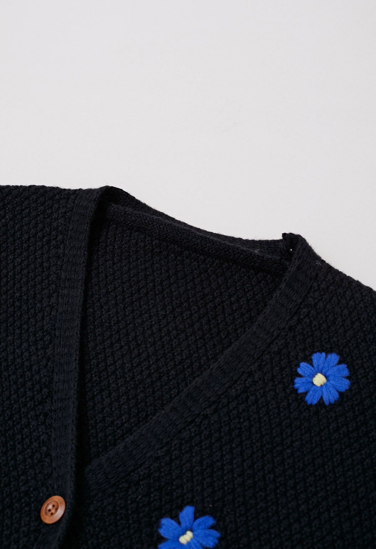 Cardigan en tricot gaufré à motif fleuri et point attachant en noir