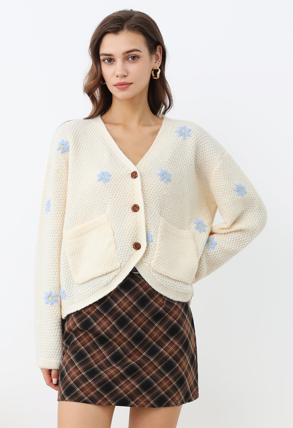 Cardigan en tricot gaufré à motif floral et point attachant en crème