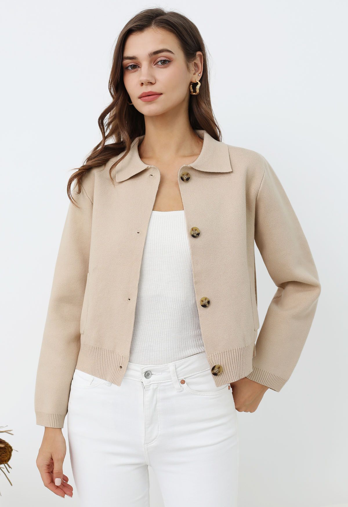 Veste en tricot boutonnée à col classique en beige clair