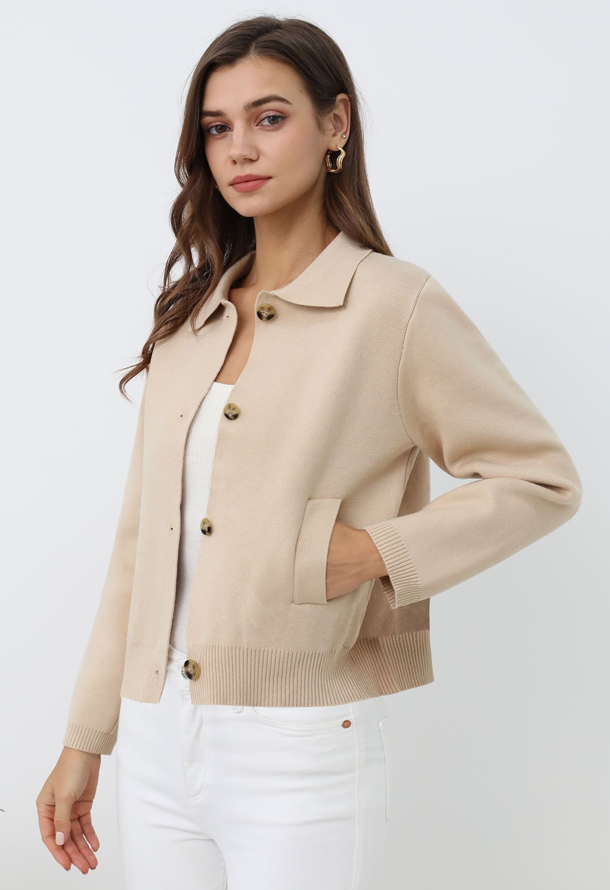 Veste en tricot boutonnée à col classique en beige clair