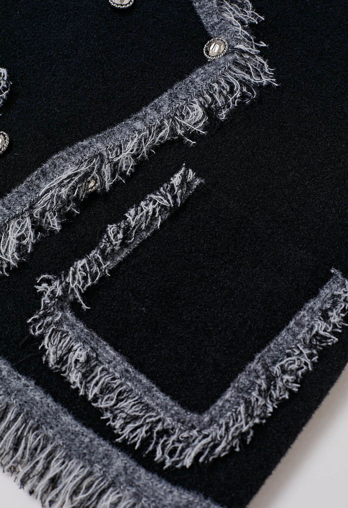 Gilet en tricot à double boutonnage avec bordure à franges en noir