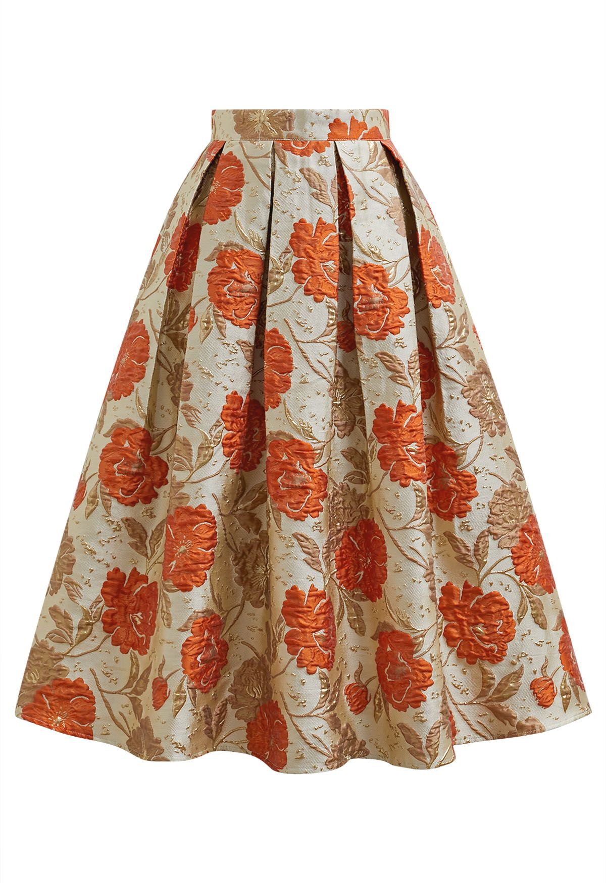 Jupe mi-longue plissée évasée en jacquard fleuri orné de motifs orange