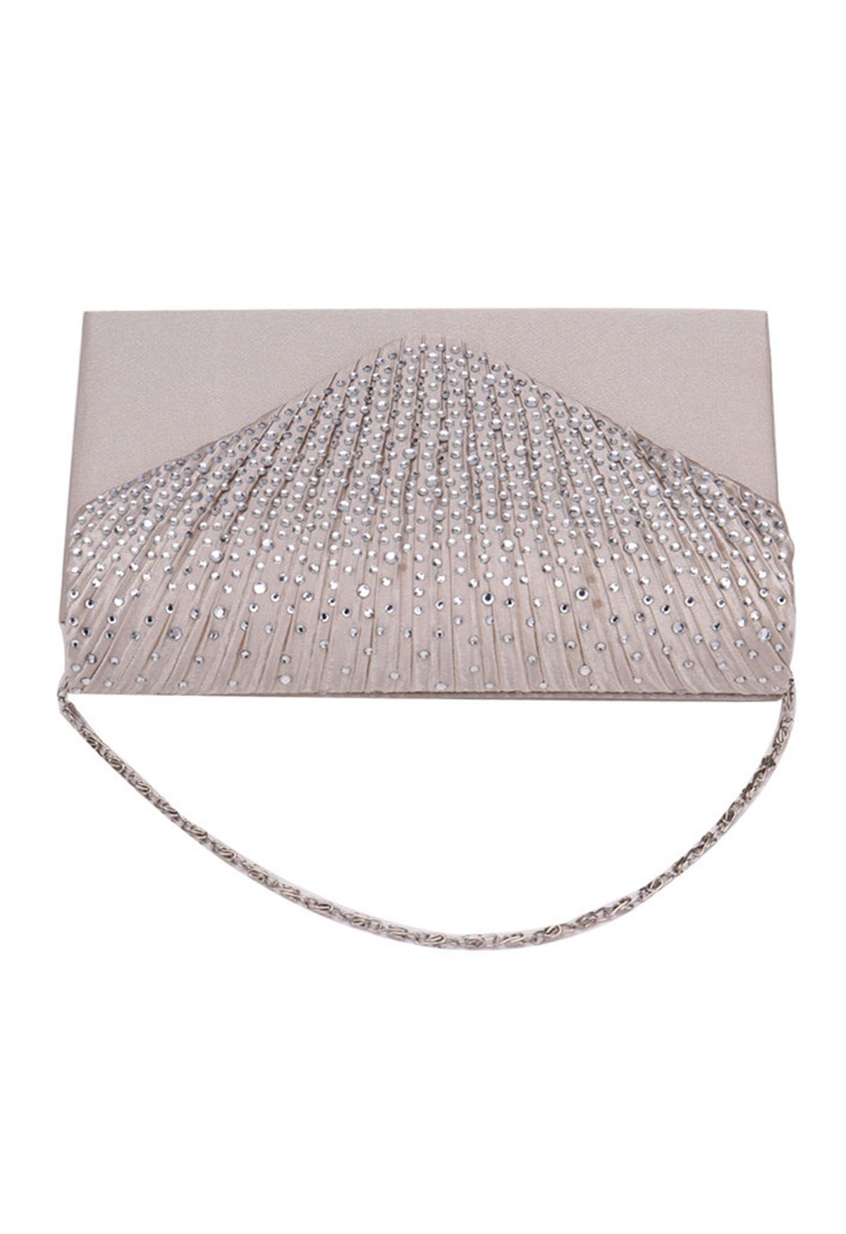 Sac enveloppe en satin orné de strass en abricot