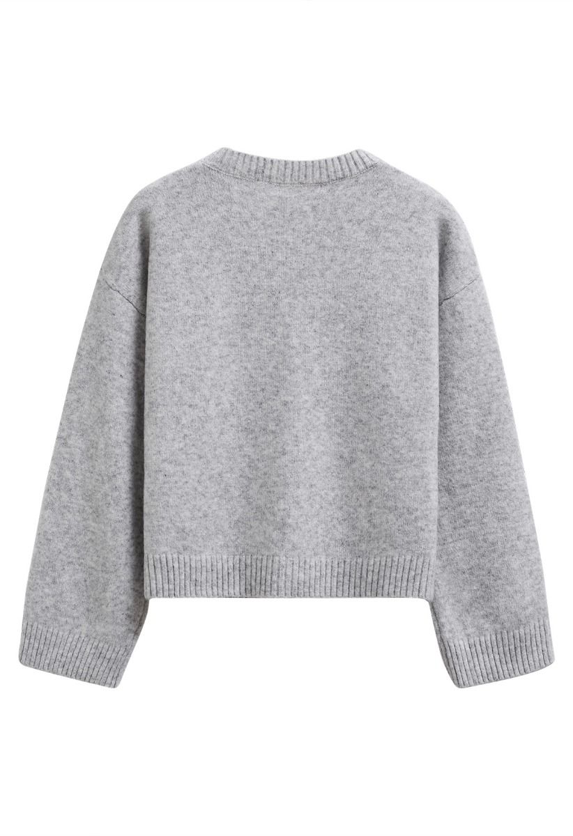 Pull en maille côtelée à pompons et à motifs floraux en gris