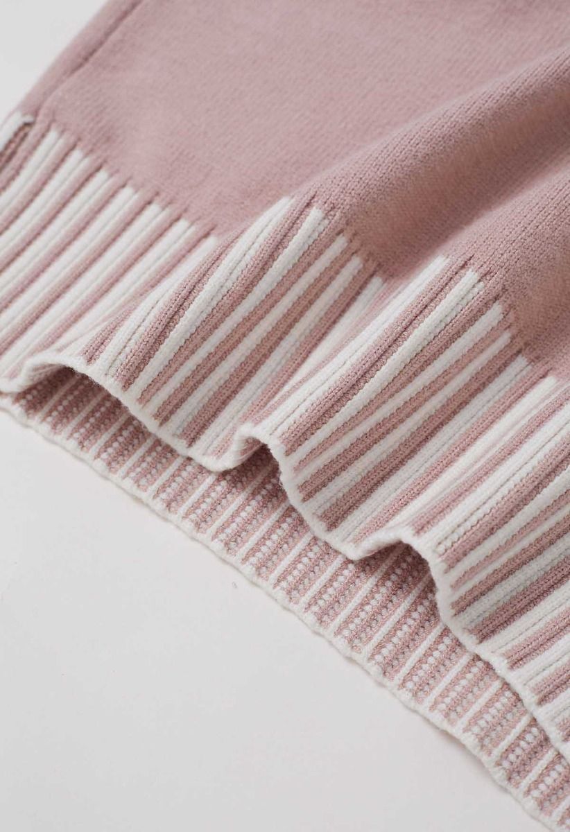 Robe pull en tricot à rayures contrastées et col montant en rose poudré