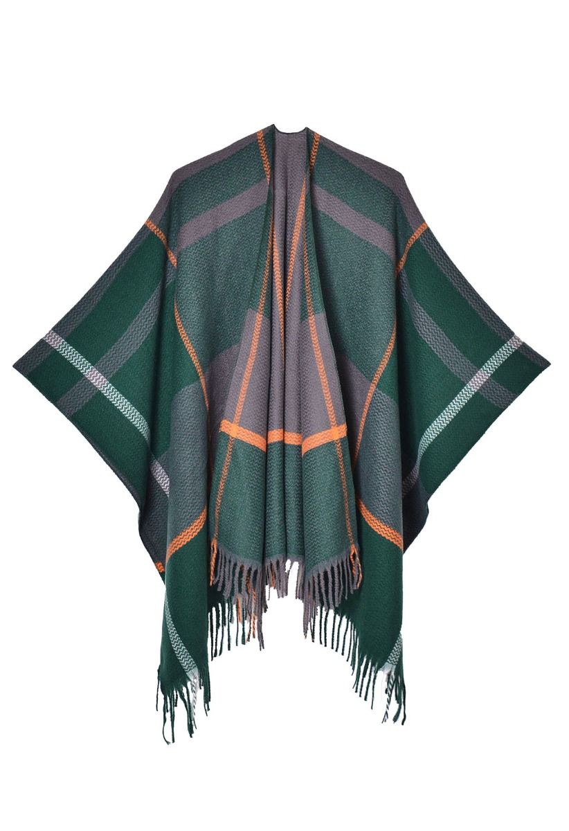 Poncho à ourlet frangé à motif géométrique en vert foncé