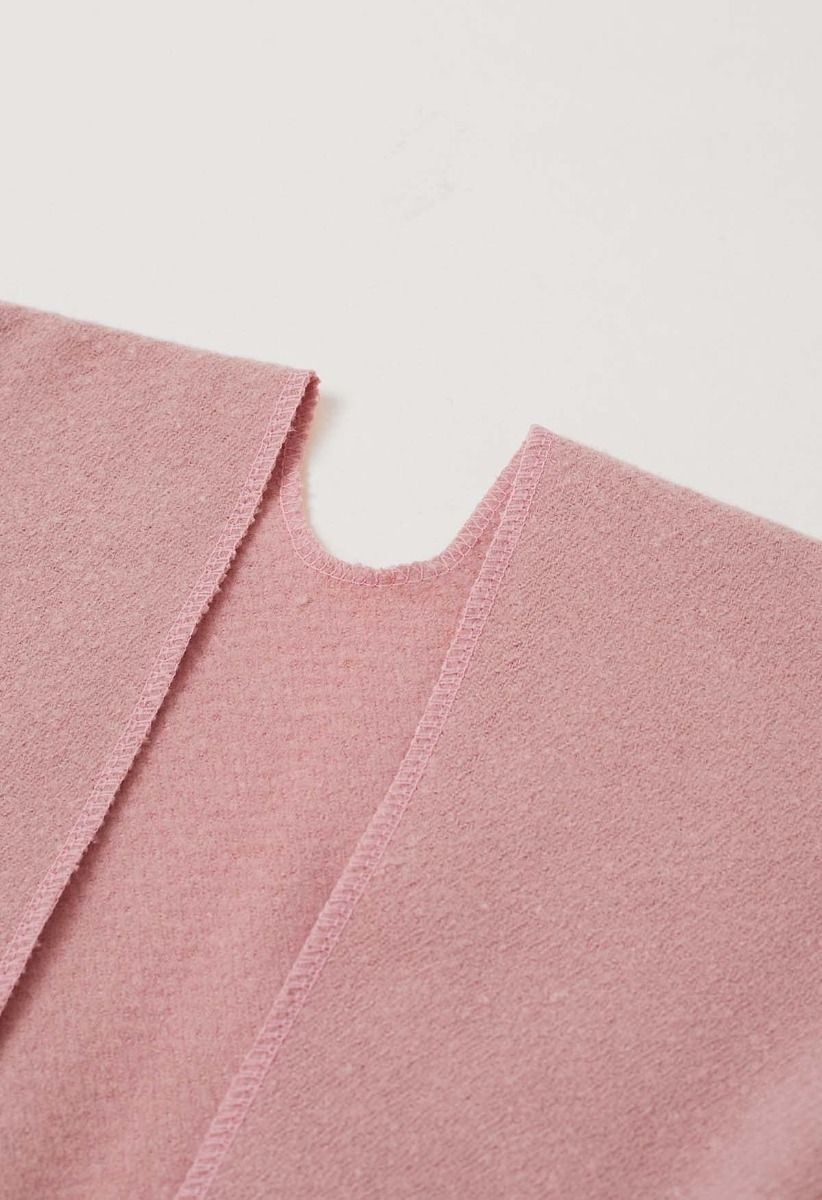 Poncho à ourlet frangé et poche Whisper Soft en rose