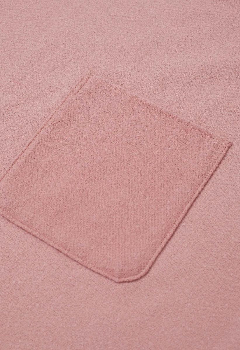 Poncho à ourlet frangé et poche Whisper Soft en rose