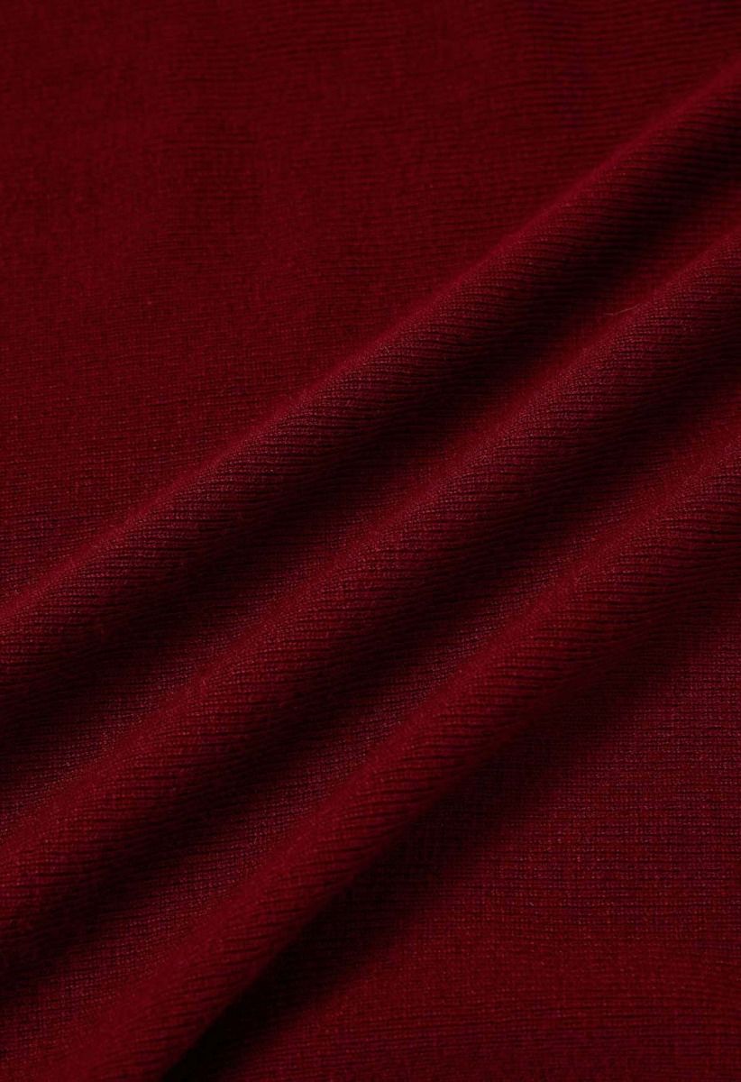 Cardigan minimaliste en tricot côtelé ouvert sur le devant en rouge