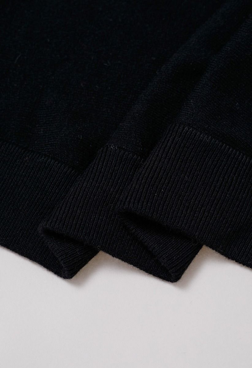 Cardigan minimaliste en tricot à bords côtelés et ouvert sur le devant en noir