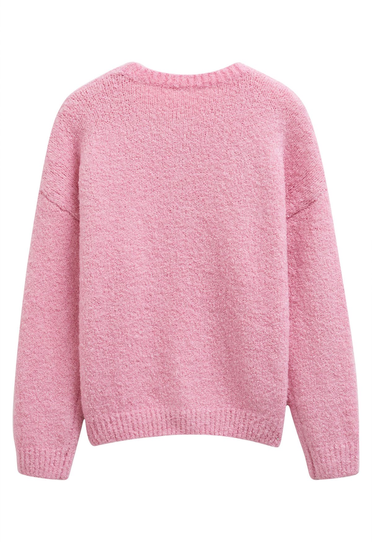 Pull en tricot doux et côtelé en rose