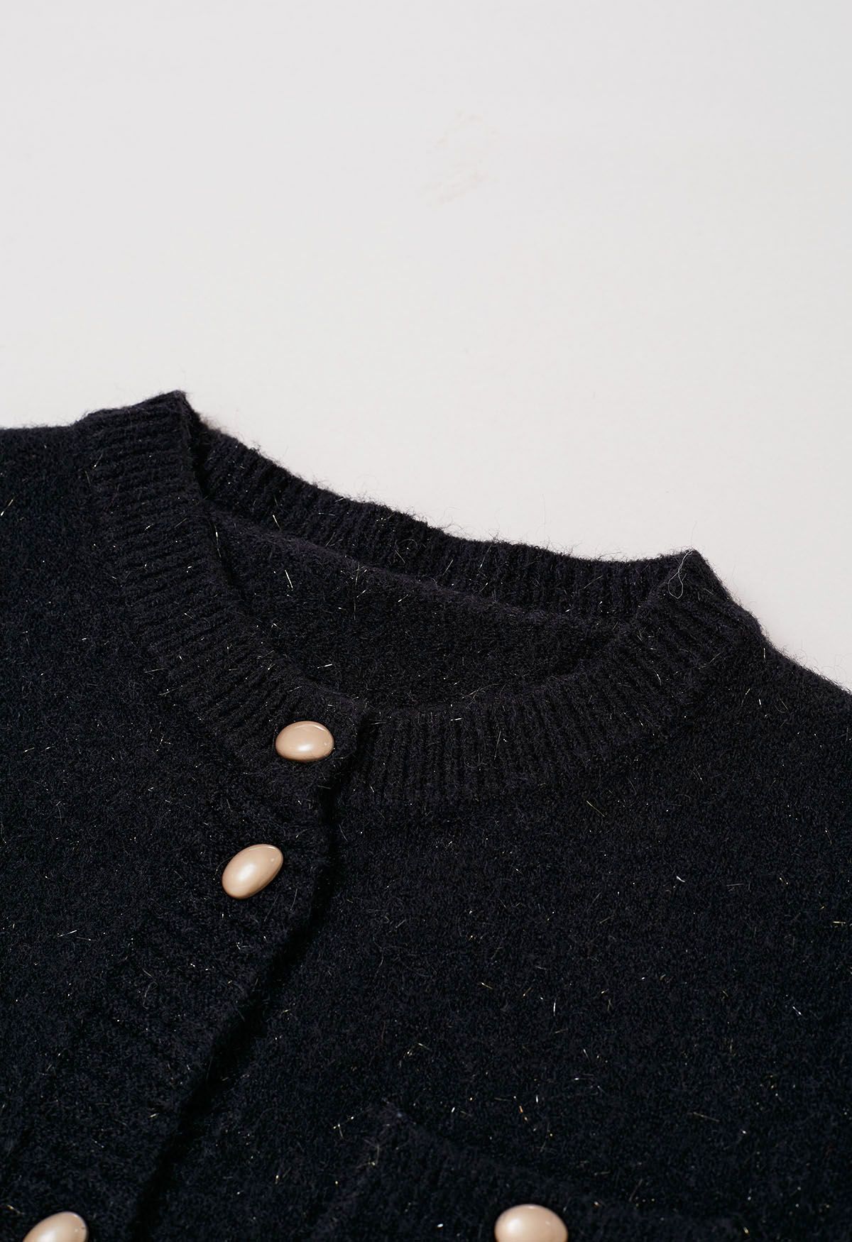 Cardigan élégant en tricot à franges scintillantes avec boutons en noir