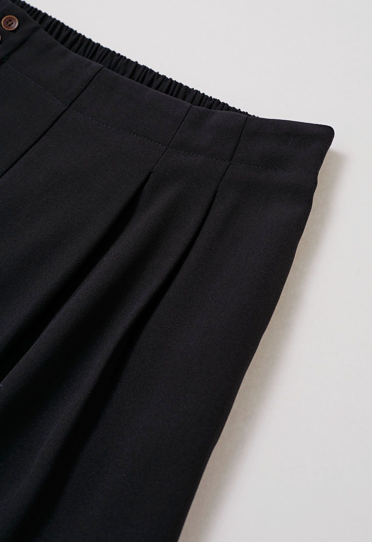 Pantalon Palazzo plissé boutonné sans effort en noir